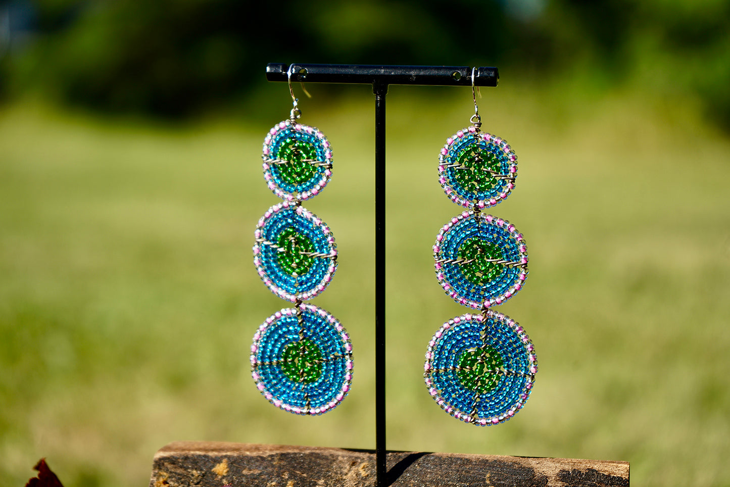 Generous (Aminini)     3 Circles Stacked    Light Blue/Green/Pink/White